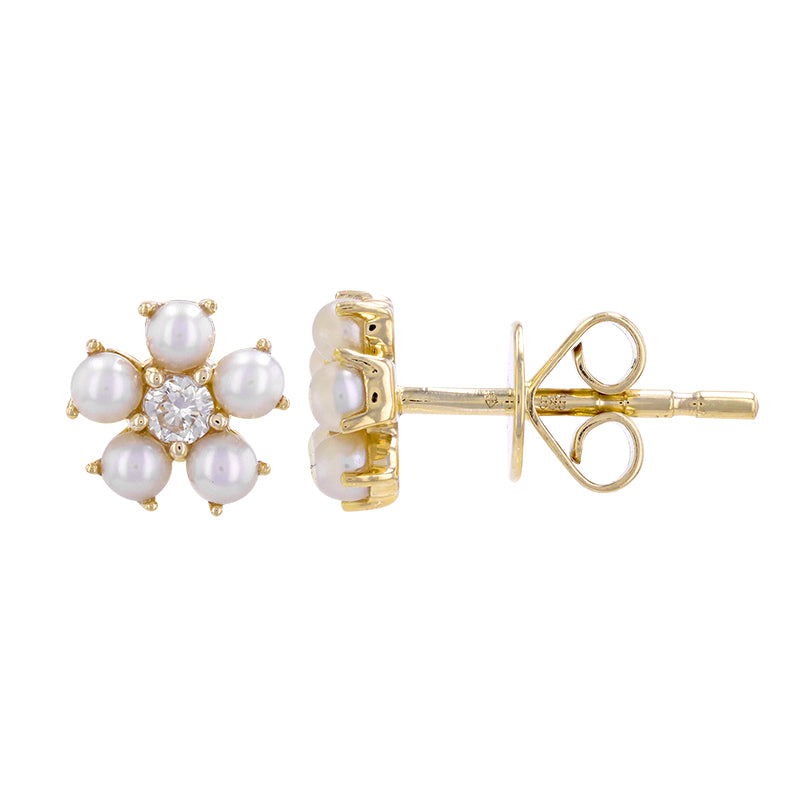 14k yellow gold pearl and diamond flower stud earrings.  .07...